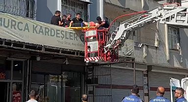 Damdan düşen kadın itfaiye tarafından kurtarıldı
