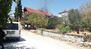 Depoda başlayan yangın eve ulaşamadan söndürüldü