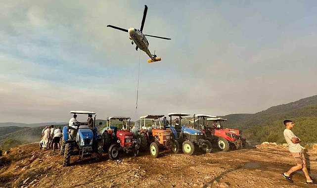 Köylüler yangına karşı seferber oldu: Tankerlerle helikopterlere su takviyesi yapılıyor