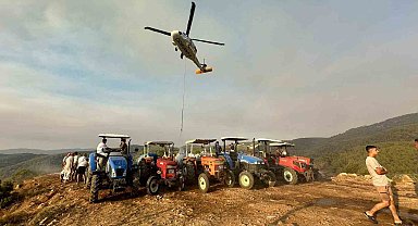 Köylüler yangına karşı seferber oldu: Tankerlerle helikopterlere su takviyesi yapılıyor