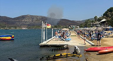 Kuşadası'ndaki orman yangını büyümeden söndürüldü