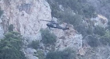 Marmaris'te kayıp kadının cansız bedeni helikopter ile adli tıp kurumuna sevk edildi