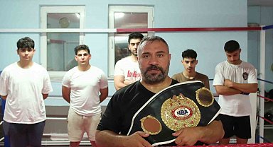 Şampiyon evinin bodrumunda sporcu yetiştiriyor