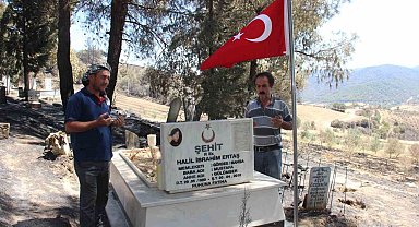 Yangında şehit mezarı yanmadı