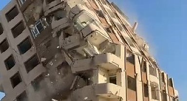 8 katlı bina iş makinesinin darbesiyle kağıt gibi yerle bir oldu