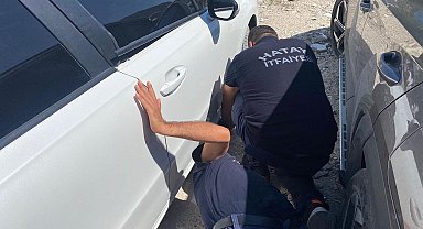 Aracın altına sıkışan köpeği itfaiye kurtardı