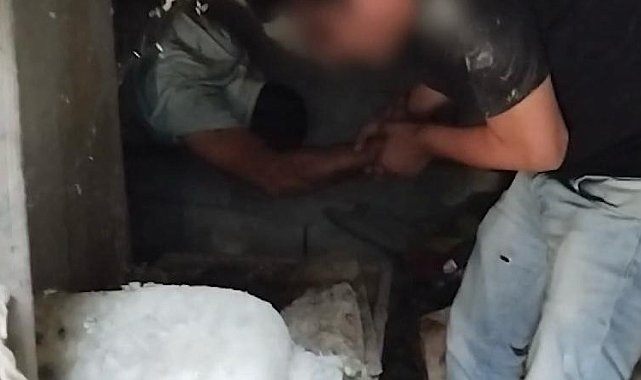 Cezaevi firarisi bidonların arasında yakalandı