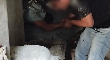 Cezaevi firarisi bidonların arasında yakalandı