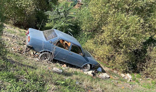Dereye uçan otomobilden burnu bile kanamadan çıktı
