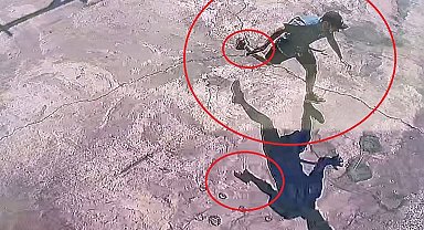 Diyarbakır'da iş yerinin önünde oturan şahsın silahlı saldırıya uğradığı anlar güvenlik kamerasında