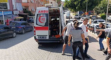 Rampa aşağı hareket eden aracı durdurmak isterken hastanelik oldu