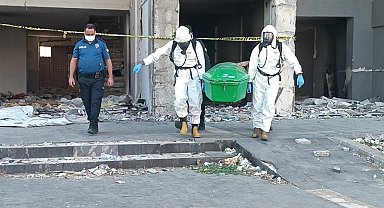 Ağır hasarlı binada ceset bulundu