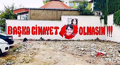 Azerbaycanlı sanatçı duvara "Başka cinayet olmasın" yazdı