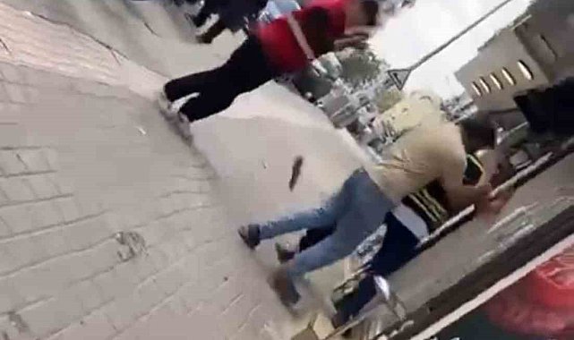 Bursa'da kuryelerin sopalı yumruklu kavgası kamerada