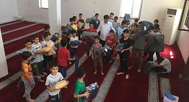 Dicle Kaymakamlığı'ndan başarılı Kur'an kursu öğrencilerine bisiklet ve kışlık kıyafet hediyesi