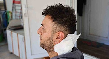 Ensesine yorgun mermi isabet eden 18 yaşındaki genç, 2 santimle ölümden döndü