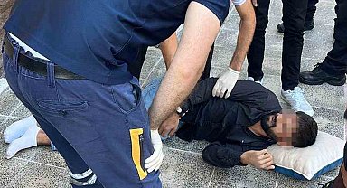 Hakkında 5 yakalama emri bulunan şüpheli polisi görünce 2. kattan atladı