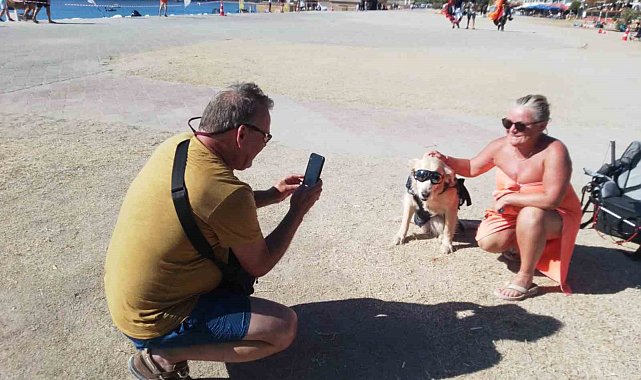 Köpeğiyle birlikte bin 700 metreden atladı