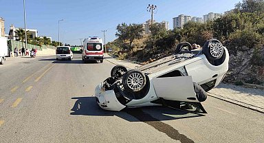 Kuşadası'nda takla atıp, ters dönen otomobildeki sürücü yaralandı