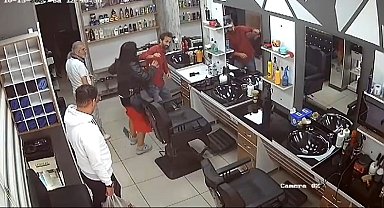 Takıntılı olduğu eski kocasının iş yerini basıp darp eden kadın kamerada