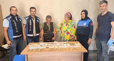 Üzerinde fazla parayla yakalanmak istemeyen dilencinin para oyununu zabıta bozdu