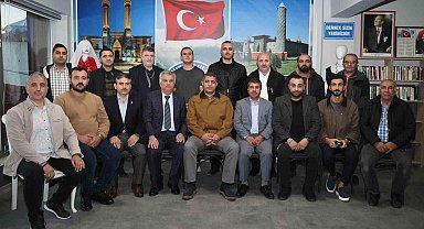 Vali Aslan'a fahri hemşerilik plaketi verildi